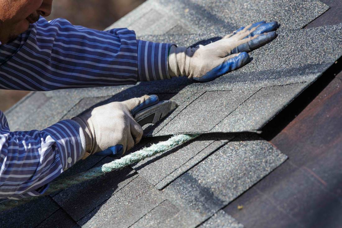 A man repair the roof